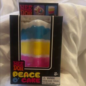 Peace O' Cake Squishy Toy - Blue, Yellow, Pink
